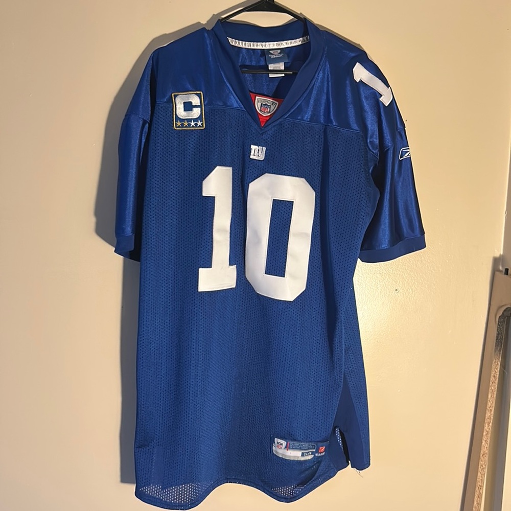 NFL equipment Eli Manning 10 blue jersey size 54 Reebok on field fits like an XL